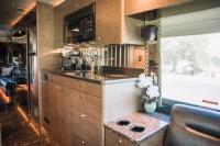 Used-2004-Amadas-Featherlite-MCI-E4500