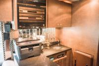 Used-2004-Amadas-Featherlite-MCI-E4500