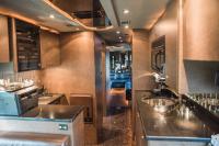 Used-2004-Amadas-Featherlite-MCI-E4500